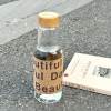 Eco-Friendly Wood-Inspired Glass Water Bottle